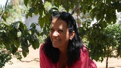 Gladys grows fruit and vegetables on the land around her house in Jinjlaya. Ahmad Ghazzaoui