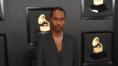 Steve Lacy arrives at the 62nd annual Grammy Awards in Comme des Garcons. AP
