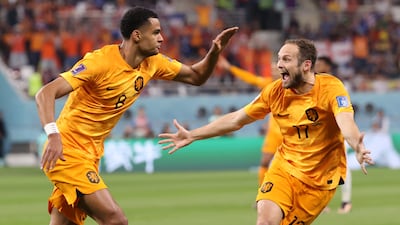 Netherlands' Cody Gakpo celebrates with Daley Blind after scoring the opening goal. EPA