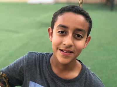 Khalifa Al Kaabi, 12, sniffed out the danger after a fire broke out on his school bus. Picture supplied by family