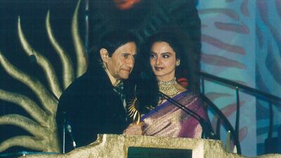 The awards returned to South Africa in 2003, this time to Johannesburg, hosted by Anil Kapoor and Dia Mirza. Pictured: veteran actor Dev Anand, who died in 2011, was given a career achievement award by Rekha.