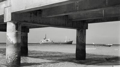 Tanker Framed by Khalid Port Bridge, Sharjah, 1960sThe Water series © Noor Ali Rashid Archives