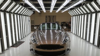 An Aston Martin illuminated for final inspection in 2017 in Warwick