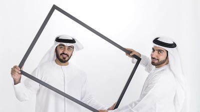 Hamad Al Shirawi, right, and his brother Abdulla have set up a business together which is the first branch of ‘Picture People’ to open outside of North America. Reem Mohammed / The National