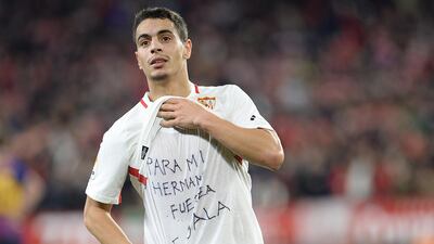 Sevilla's Wissam Ben Yedder shows a t-shirt supporting Cardiff City FC's Emiliano Sala, as he celebrates scoring his team's second goal in Seville, Spain. AFP