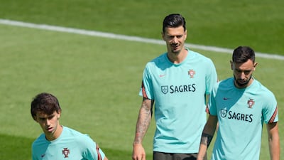 Left to right: Joao Felix, Jose Fonte and Bruno Fernandes. EPA