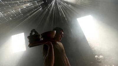 Sabri Attalah, 17, works at a pottery workshop in Gaza City. Mohammed Salem / Reuters