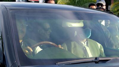 Mr Khan's arrest caused a wave of violence across the country as his supporters took to the streets. AP