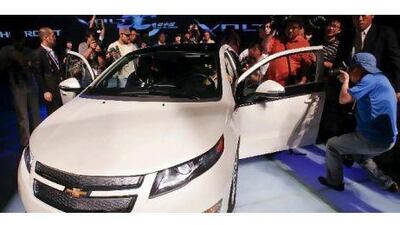 GM plans to hire 1,000 engineers to expand its range of electric cars following the launch of the Chevrolet Volt. An Tu / EPA