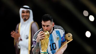 Lionel Messi of Argentina kisses the trophy after beating France 4-2 on penalties. EPA