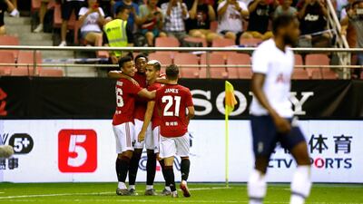 United players celebrate Anthony Martial's goal. Getty