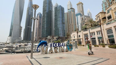 The financial and insurance sector led the UAE's economic growth in the first quarter of this year. Chris Whiteoak / The National