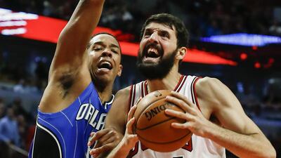 Nikola Mirotic scored 12.4 points per game for Real Madrid in Spain last season. Tannen Maury / EPA