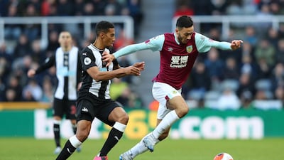 Dwight McNeil is challenged by Isaac Hayden during the Premier League match between Newcastle United and Burnley. Getty Images