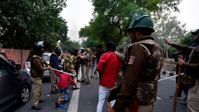 Police clash with demonstrators following a protest against the Indian government's Citizenship Amendment Bill (CAB) in New Delhi on December 15, 2019. AFP / STR