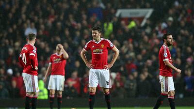 Manchester United players react after a Norwich City goal in their Premier League loss on Saturday at Old Trafford. Alex Livesey / Getty Images