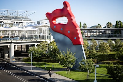 'Saw, Sawing' by Claes Oldenburg and Coosje Van Bruggen outside the Tokyo Olympic Games media centre. Getty Images