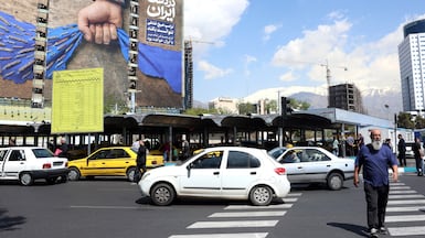 A billboard in Tehran about the Strait of Hormuz bears the slogan 'Forever on Iran's hand'. EPA