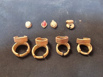 The metal earrings discovered in the tomb are believed to be made of gold. Photo: Egyptian Ministry of Tourism and Antiquities