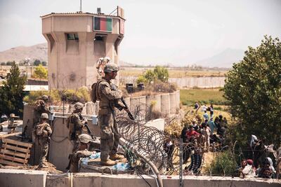 US troops providing security at Kabul's airport as evacuations cause chaos in the city. AFP/US Marine Corps
