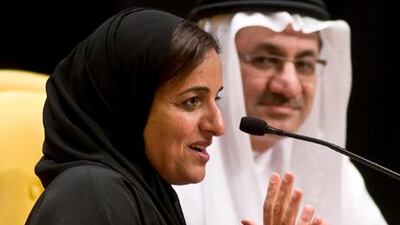 Sheikha Lubna Al Qasimi and H.E. Humaid Qattami, Minister of Education for the UAE, answer questions from young female students at the University City Hall in Sharjah.