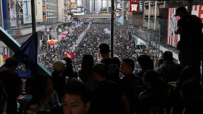 Protesters attend the annual pro-democracy rally. AFP