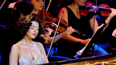 The charismatic Georgian pianist Khatia Buniatishvili is already known for distinctive performances that delight audiences – and sometimes divide critics. Boris Horvat / AFP