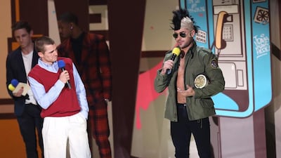 Dave Franco, left, and Zac Efron accept the award for best duo for Neighbors at the MTV Movie Awards. Matt Sayles / Invision / AP