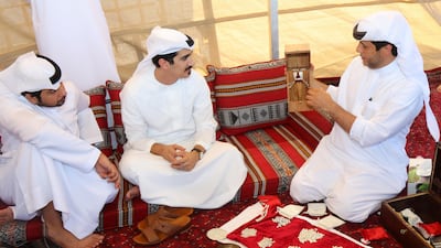 Sheikh Dr Majid Sultan Al Qasimi and Abdullah Al Suwaidi, founder of Suwaidi Pearls, at Al Suwaidi Pearl Farm. Courtesy Ministry of Climate Change and Environment