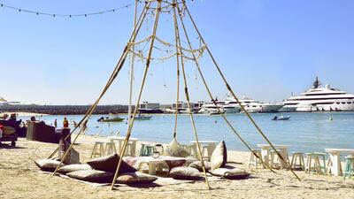 Enjoy the sunset at laid-back restaurant and bar Fish Beach Taverna. Photo: Fish Beach Taverna