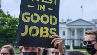 A protest outside the White House in Washington demands action on climate change and green jobs. Reuters