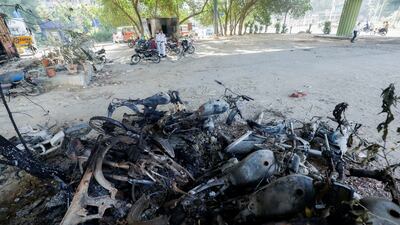 Motorcycles were also set on fire by Khan supporters. Reuters