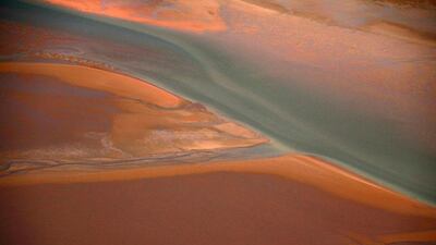 A beach can be seen along the coastline of Arnhem Land, east of Darwin.
