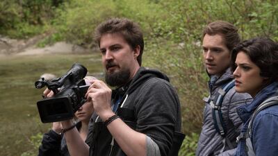 Adam Wingard, left, with James Allen McCune and Callie Hernandez on the set of Blair Witch. Chris Helcermanas-Benge