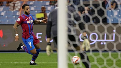 Memphis Depay 6 On for Gavi after 78. A brave substitution by Xavi who put more attackers in an already attacking line up. AFP