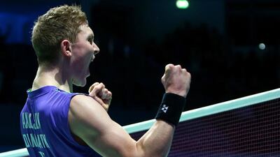 Viktor Axelsen of Denmark celebrates after beating world No 1 one Chen Long. AFP