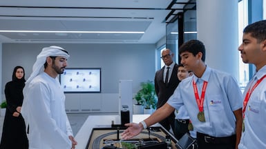 Sheikh Hamdan bin Mohammed, Crown Prince of Dubai, Deputy Prime Minister and Minister of Defence, is shown the gold medal-winning Smart Irrigation Train project. Photo: Sheikh Hamdan bin Mohammed
