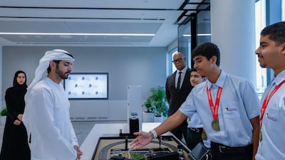 Sheikh Hamdan bin Mohammed, Crown Prince of Dubai, Deputy Prime Minister and Minister of Defence, is shown the gold medal-winning Smart Irrigation Train project. Photo: Sheikh Hamdan bin Mohammed