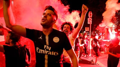Paris Saint-Germain supporters celebrate their team's 3-0 win over RB Leipzig in Paris. AFP