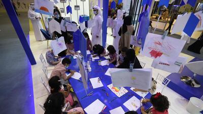 Children take part in a workshop. EPA
