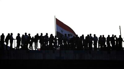 Syrians await the release of detainees held in regime prisons. AFP