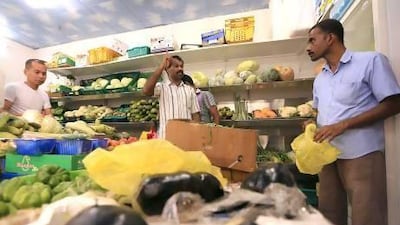 Al Ward Trading fruit and vegetable shop in the Tourist Club area. Its manager, Ashraf Ali, says there was a 20 per cent rise in prices in the first two days of Ramadan. Ravindranath K / The National
