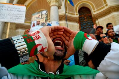 Algerian protestors shout slogans during a demonstration marking May Day in Algiers. AFP