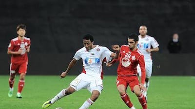 Al Jazira, white, beat Baniyas 5-0 to keep up their title chase. They are one point behind Al Nasr in second and four behind the league leader, Al Ain.