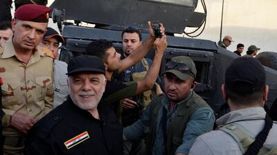 Haider Al Abadi, Iraq's prime minister, attends an event to announce victory over ISIL in Mosul. Reuters