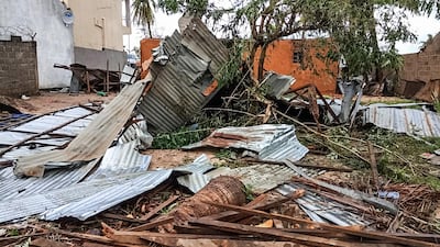 A view of a damaged house in Macomia following Cyclone Kenneth on April 28, 2019. Thousands of people in remote areas of storm-lashed Mozambique were homeless and bracing for imminent flooding April 27, food and water shortages as Cyclone Kenneth flattened entire villages, leaving rescuers struggling to reach them. AFP