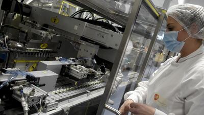 GlaxoSmithKline and partner Sanofi have delayed the release of their vaccine by a year. AFP