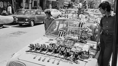 A Beirut street vendor selling goods on April 21, 1976, as some semblance of normal life resumed following a truce.