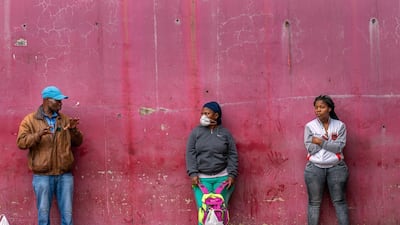 Residents of the Alexandra township of Johannesburg, South Africa, wait in line to enter a supermarket on April 3, 2020. AP Photo