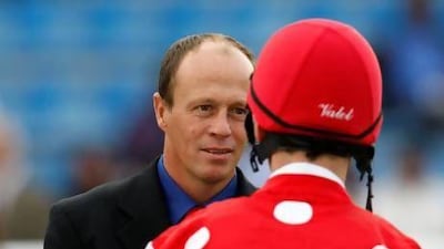 Ernst Oertel, left, is in his second season as the lead trainer at the Al Asayl Stables.